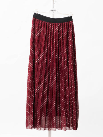 Long pleated skirt with polka dots