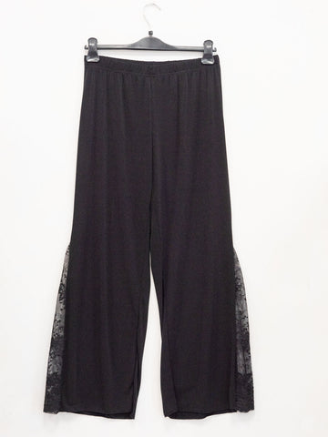 Pantalone con pizzo