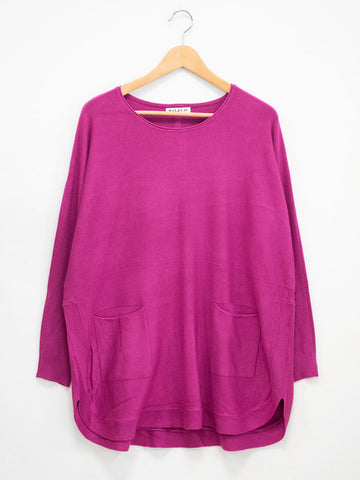 Viscose sweater with pockets and buttons on the back